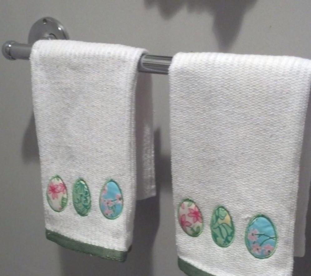 easter egg applique stitched out on hand towels are a great machine embroidery project for Easter