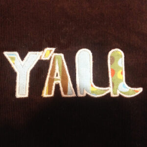 Rustic Y’all machine embroidery and applique design with cowboy boots.  Add a “hello” to the top for a cute Western greeting.