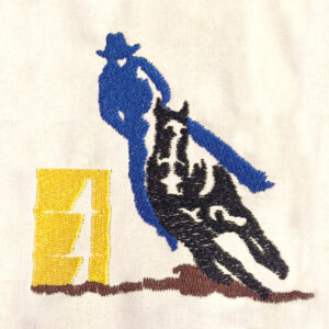 Cowboy on horse barrel racing machine embroidery design.