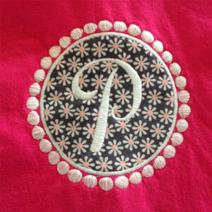 Modern dot wreath with single initial modern machine embroidery design in 2 sizes. Includes all letters plus an empty wreath.