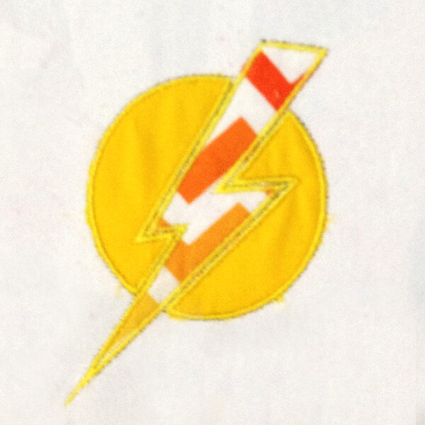 Lightning bolt machine applique design in two different styles within