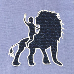 It’s good to be king – boy riding on lion machine appliqué or embroidery design in several sizes and styles