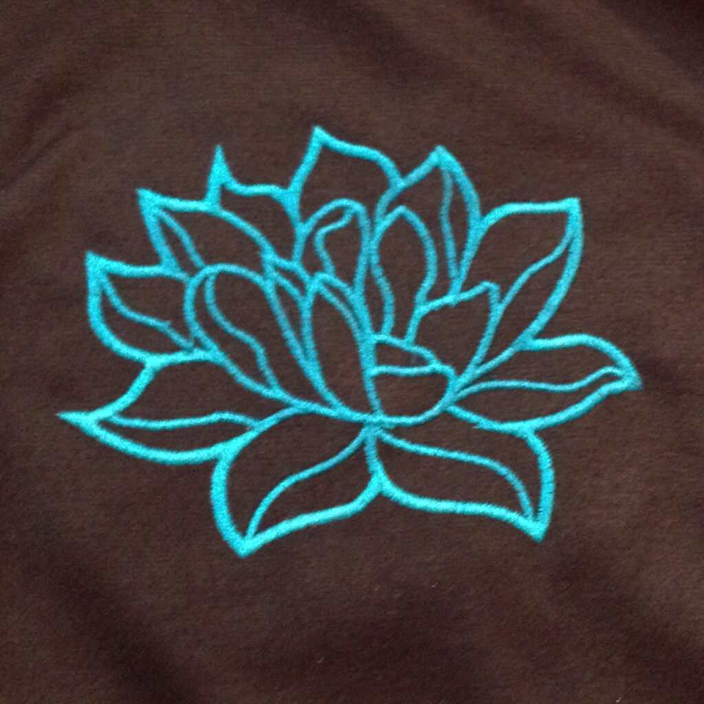 Modern and elegant lotus flower applique / embroidery design. Simple