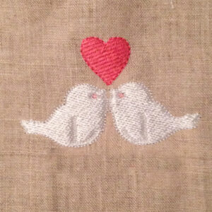 The perfect engagement or anniversary gift for the lovebirds in your life.  Applique and embroidery lovebird designs in several sizes.