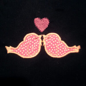 The perfect engagement or anniversary gift for the lovebirds in your life.  Applique and embroidery lovebird designs in several sizes.