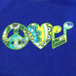 Peace, love and music machine applique design. Two different versions in three sizes.