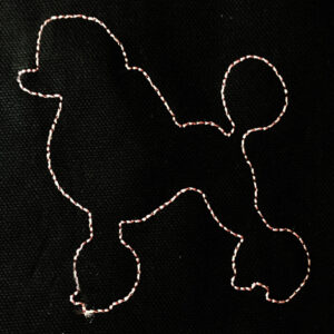 Standing dog – poodle – machine embroidery and appliqué designs in several sizes and styles.