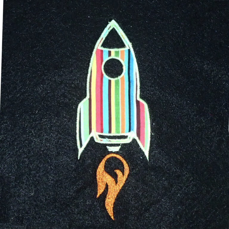 Blast off into space with this cute rocketship machine embroidery and Blast off into space with this cute rocketship machine embroidery and