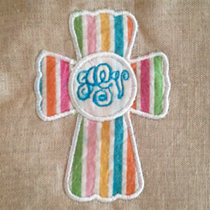 Applique cross designs with circle in center for custom monogram.  Two styles of cross appliques – satin and triple stitch
