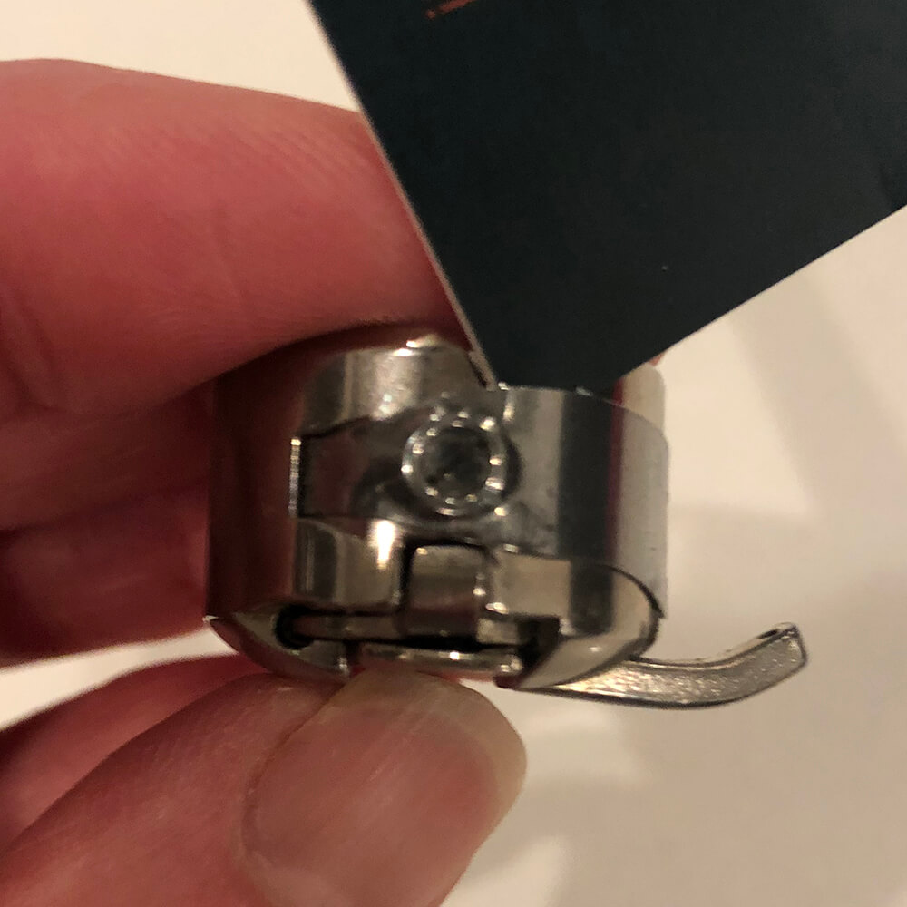 business card can be used to remove strings stuck in bobbin case