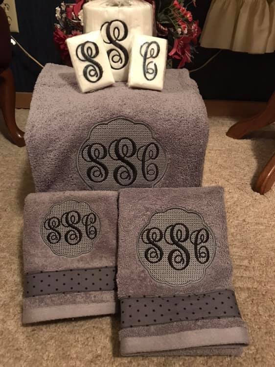 monogrammed towels, soap, and toilet paper