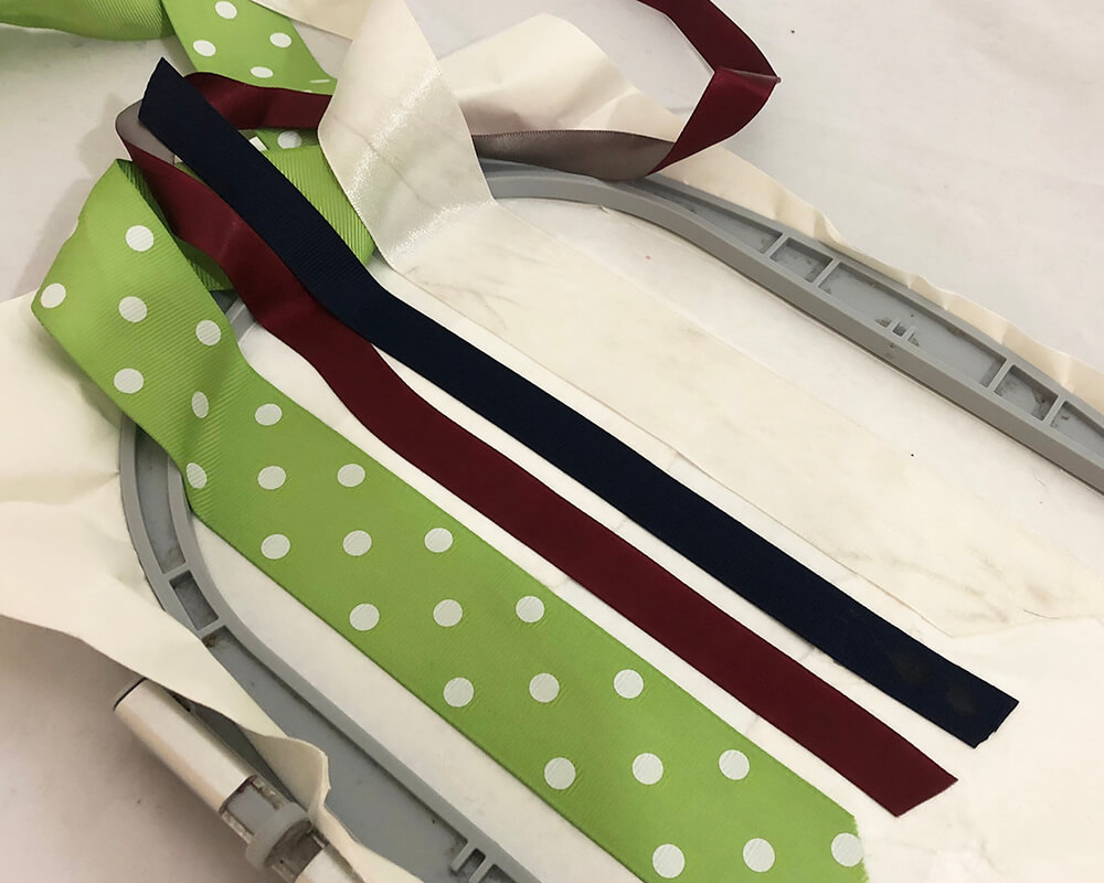 floating ribbon on hooped stabilizer for machine embroidery