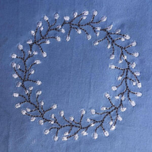 Delicate winter wreath with berries