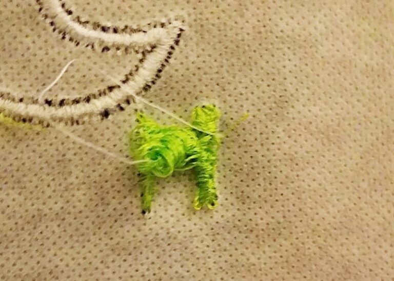 Why is my thread bird nesting underneath the embroidery?