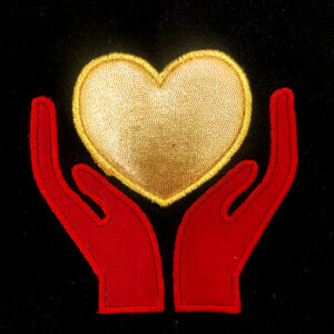 Hands in heart appliqué design