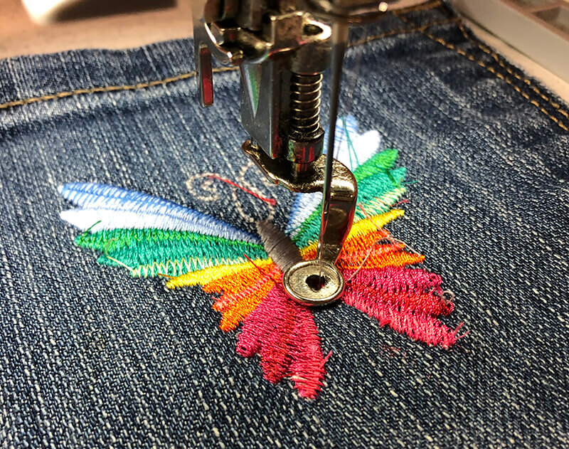 embroidering on back jeans pocket