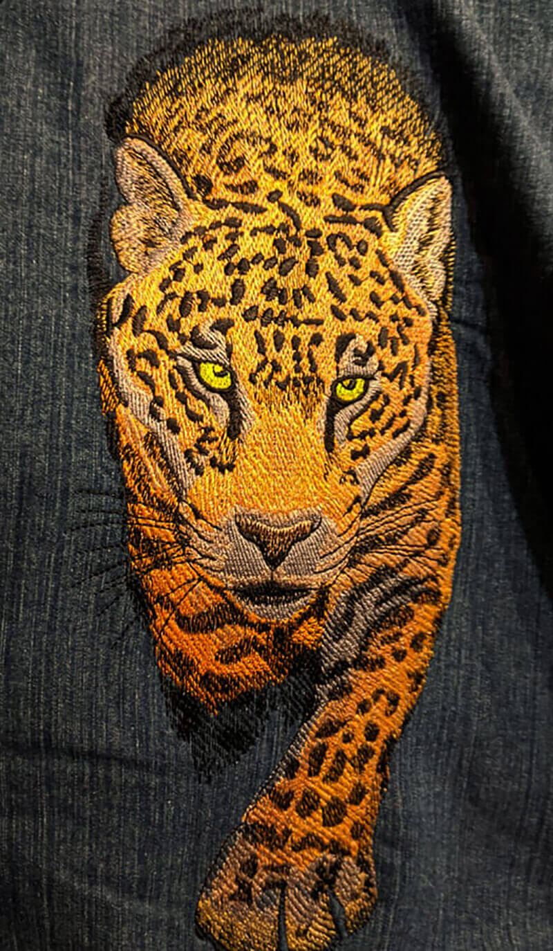 tiger embroidery design on denim 