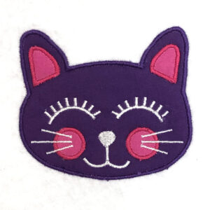 Cute cat face machine applique design. Perfect little kitty for a little girl who loves cats!