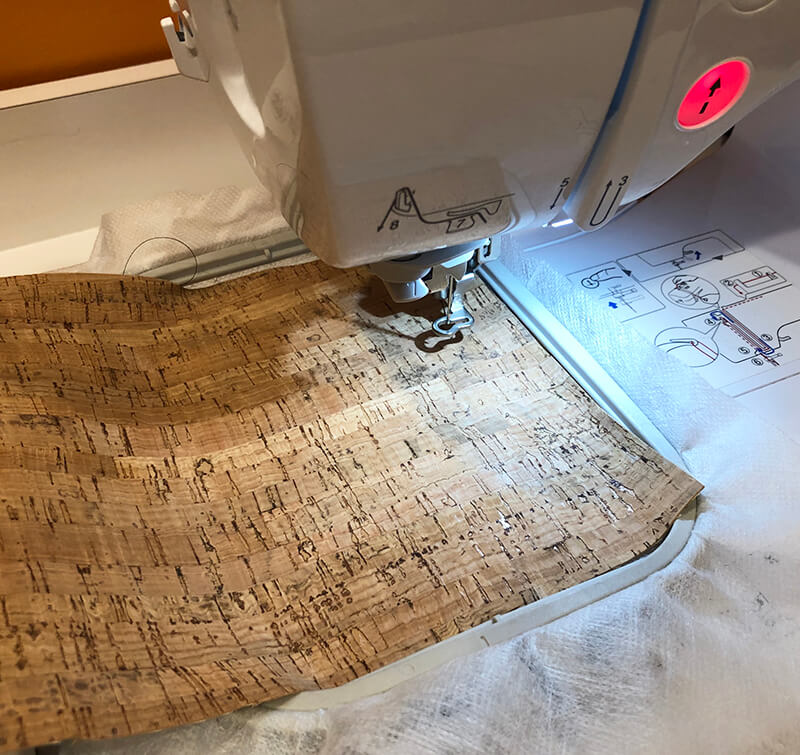 cork fabric floated on hooped stabilizer
