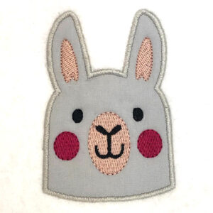 Llama face appliqué design
