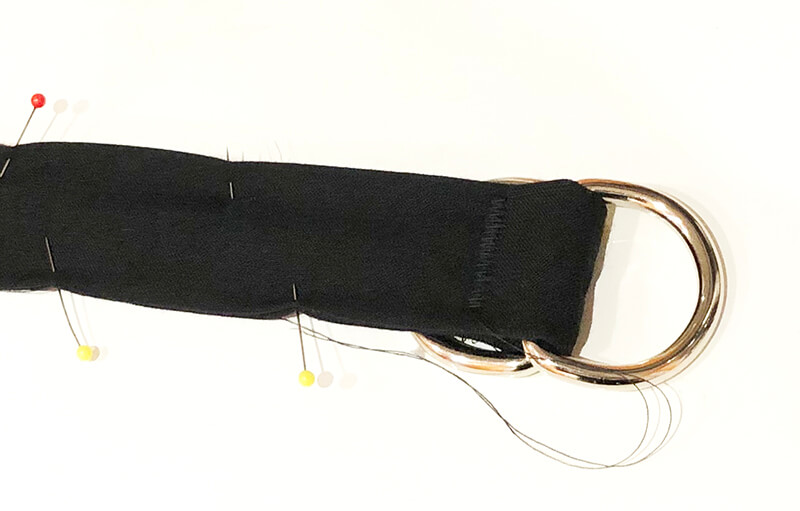 Adding D-rings to embroidered belt