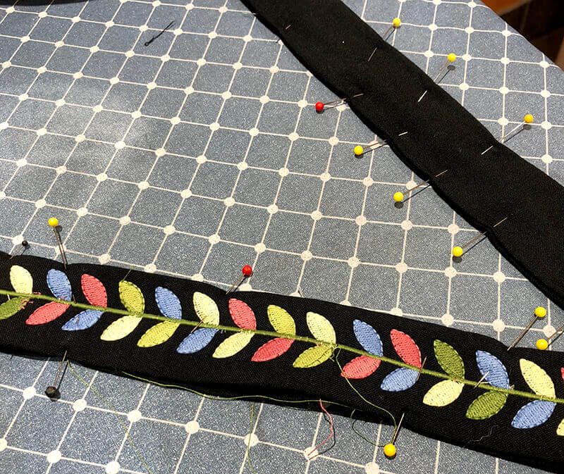 pinning front and back of embroidered belt together