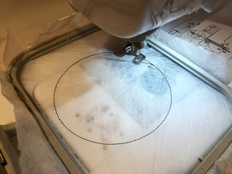 Placement stitching for in-the-hoop coaster