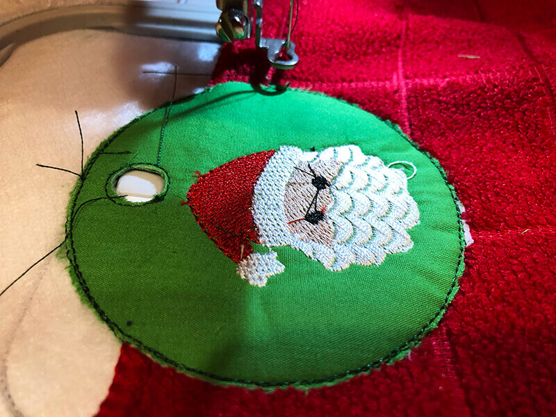 stitching back to front - in-the-hoop towel topper