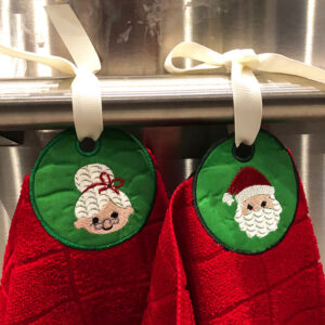 In-the-hoop Santa and Mrs. Claus towel topper