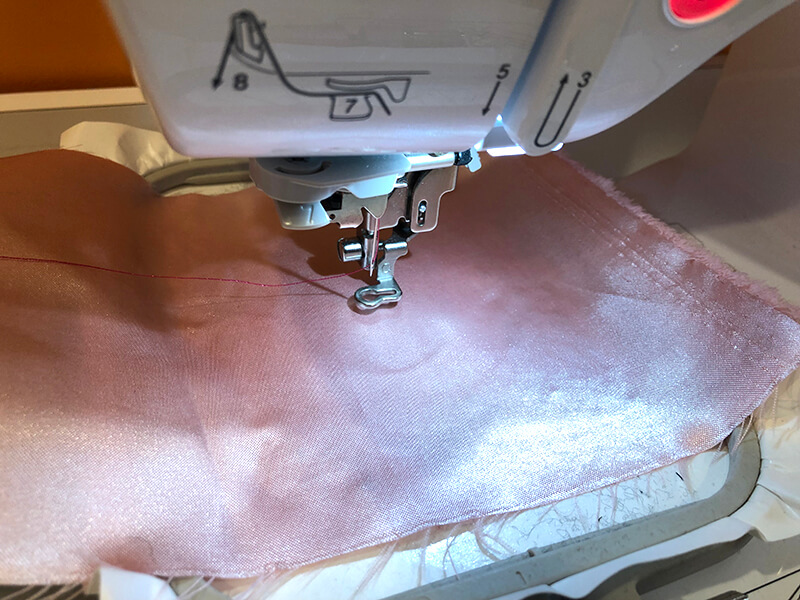 floating satin on tear away stabilizer for embroider