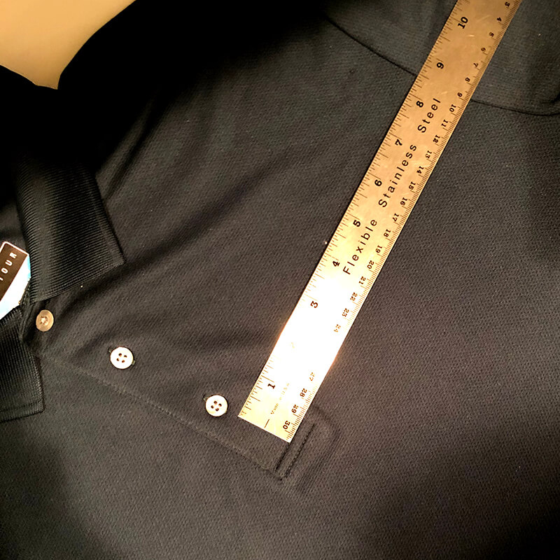 measuring the horizontal location of the embroidery on the polo