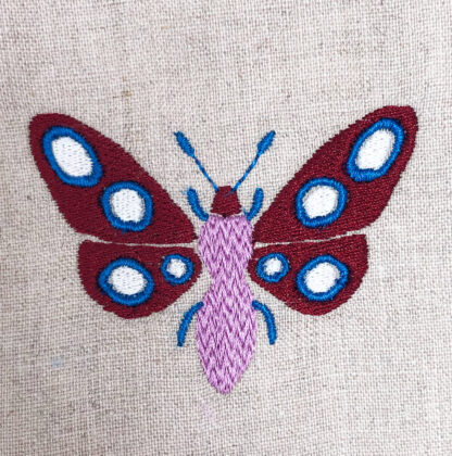 colorful moth embroidery design