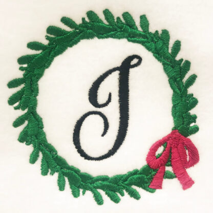 leafy green wreath with bow embroidery design