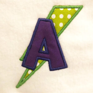 Letters with lightning bolt appliqué design