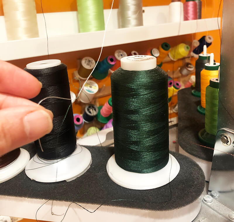 threading a multi-needle embroidery machine