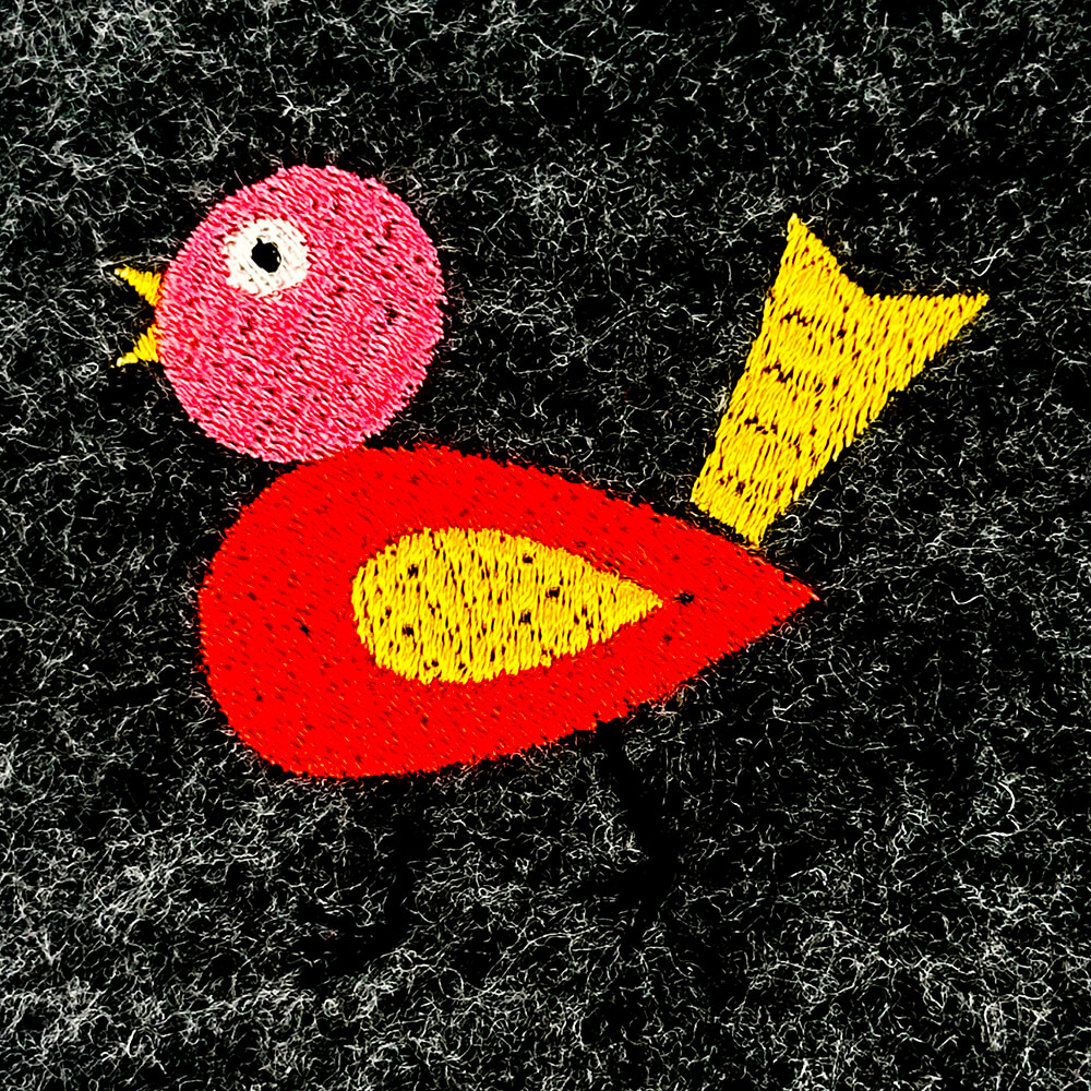 Colorful goofy bird embroidery design
